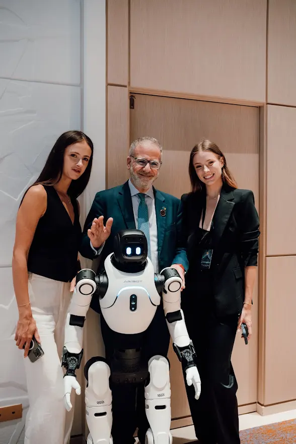 Humanoid robot naturally interacting with people at a Monaco event
